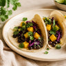 Tacos con fagioli neri e mango: ricetta vegetale